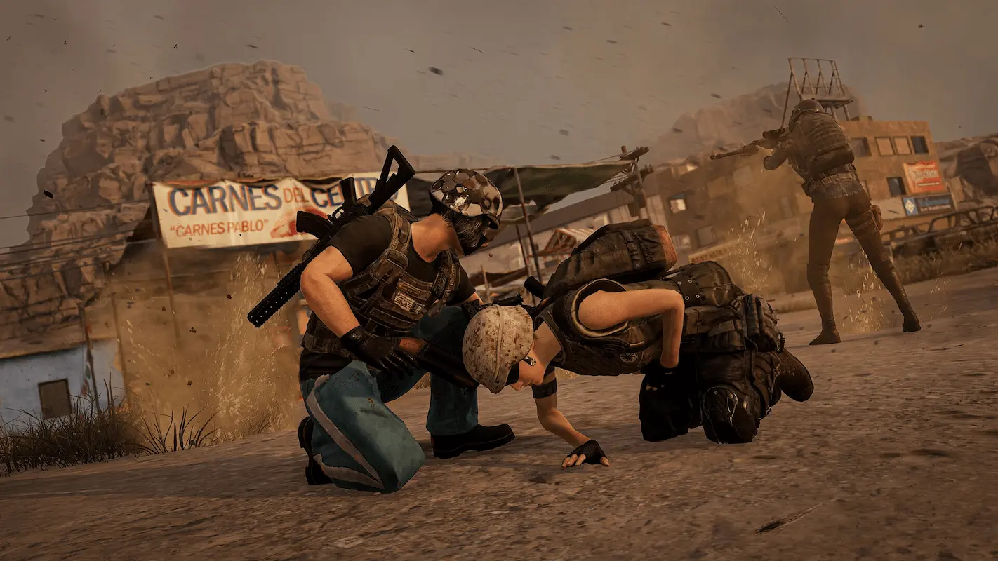 Jogadores de PUBG abaixados durante ataque no mapa do jogo.