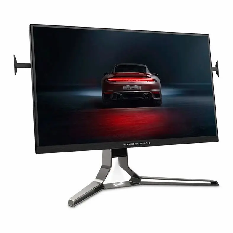 Monitor Porsche Design exibindo imagem de um carro esportivo visto por trás em uma pista escura com luzes vermelhas destacando o veículo.